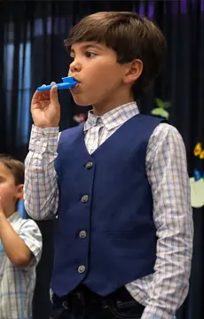 A student plays an instrument during a Mt. Helix Academy performance.